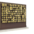Dark Wall with Multiple Golden Plaques and Elegant White Base 3d model