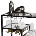 Stylish Black Serving Cart With Glass Shelves Plates Glasses And Magazine