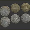 Intricately Sculpted Silver And Gold Coins With Detailed Carved Designs Stacked And Scattered