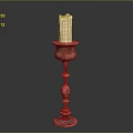 Ornate Red Candlestick Holder With White Candle And Detailed Carvings