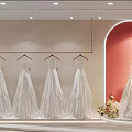 Elegant Bridal Shop Interior With Wedding Dresses And Display Shelves