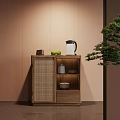 Wooden Cabinet with Wicker Door Holding Kettle Green Apples and Bowls by Green Plant
