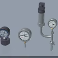 Industrial Equipment Including Pressure Gauges With Different Sizes And Pipe Fittings