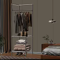 White Clothes Rack With Hanging Clothes Shelves Folded Towels And Handbag In Cozy Bedroom