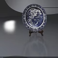 Blue And White Porcelain Plate With Traditional Landscape Pattern On Wooden Stand