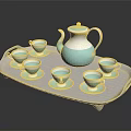Elegant Blue And White Tea Set With Teapot Teacups Saucers Gold Accents On Gray Tray