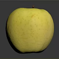 Fresh Yellow Apple With Shiny Surface On Dark Background For Healthy Snack