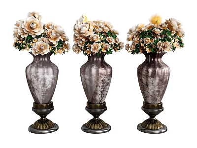 Three Metallic Vases With Decorative Bases Holding White And Beige Flowers With Green Leaves 3d model