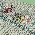 Colorful Bicycles Parked at Outdoor Bike Rack on Brick Paved Surface