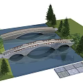 Stone Arch Bridges Spanning River With Green Trees and Grass Near Paved Walkway