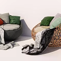 Gray And Wicker Round Single Sofa With Colorful Cushions And Soft Blanket
