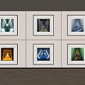 Six Framed Artworks With Geometric Shapes On White Wall And Herringbone Floor