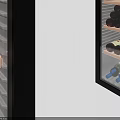 Two Black Modern Wine Coolers With Glass Doors And Multiple Storage Shelves