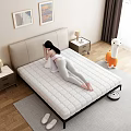 Cozy Double Bed With Quilted Mattress Nightstand Lamp And Wall Art In Bedroom