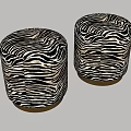 Two Round Decorative Stools With Zebra Print Upholstery And Dark Base 3d model