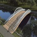Arched Landscape Bridge With Wooden Deck White Railings Over River And Green Trees