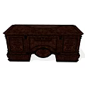 Vintage Dark Wooden Desk With Intricate Carved Details And Drawers