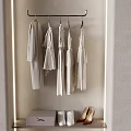 Elegant White Clothes Hanging In Illuminated Wardrobe With Shoes And Box
