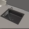Modern Black Kitchen Sink With Faucet On Light Colored Countertop Surface