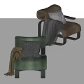 Green and Brown Leisure Chairs Featuring Knitted Pillows Cozy Blankets and Modern Metal Legs