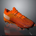 Orange Soccer Cleats Featuring White Stripes Studded Sole and Ultra Boost Pro Technology
