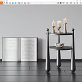 Modern Black Three Tier Side Table With Candles Bowl And Open Book