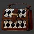 Stylish Leather Handbag With Black White Argyle Pattern Brown Trim Golden Buckle And Top Handle