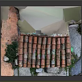 Miniature Stone House Model Featuring Red Tiled Roof Wooden Door Green Mailbox And Plants