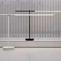Modern Black and White Table Lamps with Adjustable Arms and Sleek Design