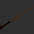 Wooden Wand Weapon With Brown Handle And Slender Shaft On Gray Background