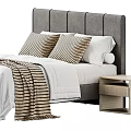 Modern Bedroom Interior With Gray Headboard White Comforter Striped Pillows And Nightstand