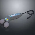 Gray Handheld Massager With Two Round Massage Heads Power Cord Control Buttons And Cartoon Pattern