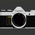 Vintage Canon SLR Camera With Silver Black Body And Classic Lens