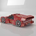 Red Sports Car With Streamlined Design Gold Patterns Two Door And Large Wheels
