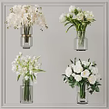 Elegant Modern Clear Glass Vases With White Roses Lilies And Fresh Green Leaves