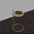 Round Coffee Table With Golden Stand Black Tray Pine Cones On Dark Wood Floor White Wall
