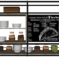 Dinnerware Set Display With Plates Jars Baskets And Taco Time Menu Board