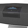 Modern Black And Silver Soundbar With Sleek Design And Metal Stand