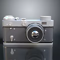 Vintage Computer Camera With Silver Body Black Details Lens And Buttons