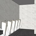 Public Toilet With Light Colored Stalls Black Frames And Modern Clean Design