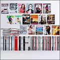 Diverse Books And Magazines Collection With Various Covers And Stacked Design