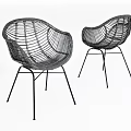 Two Modern Wicker Leisure Chairs With Ergonomic Shape And Metal Frames 3d model