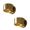 Two Golden Modern Wall Sconces With Warm Light On Light Colored Wall 3d model