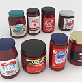 Assorted Strawberry Jam Jars With Red Contents And Colorful Lids