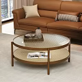 Round Coffee Table with Glass Top Brown Frame Woven Shelf Tray Water Bottle and Magazines
