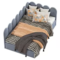 Cozy Kids Bed with Scalloped Headboard Blue Tan Blankets and Pillows