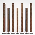 Multiple Wooden Columns with Intricate Carved Patterns and Unique Designs
