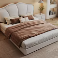 Double Bed With White Upholstered Headboard Brown Comforter And Nightstands In Modern Bedroom Interior