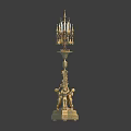 Ornate Golden Decorative Candelabra With Multiple Candle Arms And Figural Base
