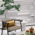 Stylish Leisure Chair With Yellow Cushion Green Plant And White Table Against Gray Stone Wall